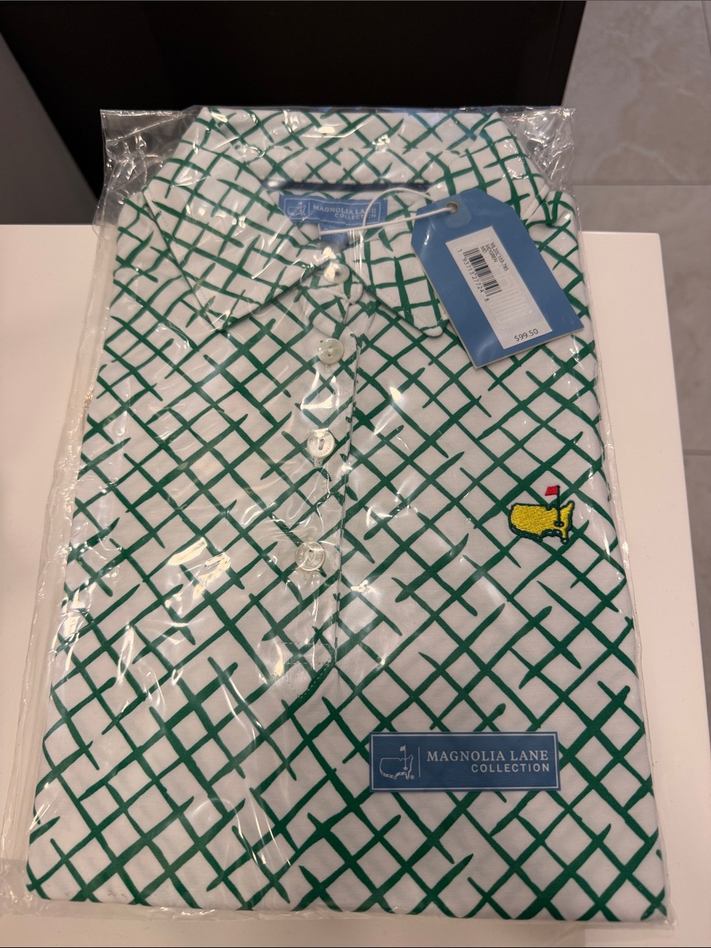 Magnolia Lane Women’s White Polo with Green Lattice Pattern